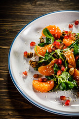 Vegetable salad on wooden background