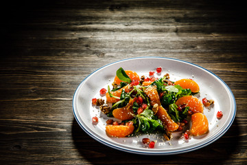 Vegetable salad on wooden background