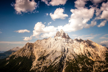 Croda Rossa Peak with clouds summer panorama, Cortina d'Ampezzo, Dolomites, Italy