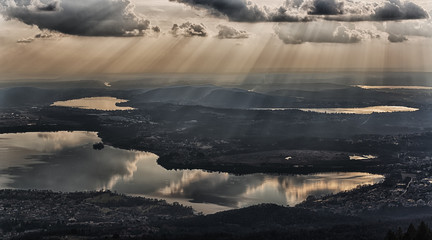 Clouds over the lake with sunbeams