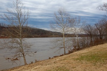 The river at the park on a cloudy winter day.