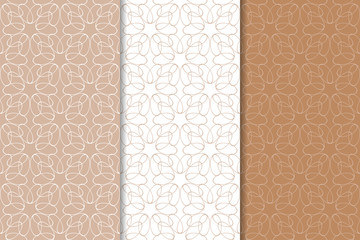 Brown and white geometric seamless patterns