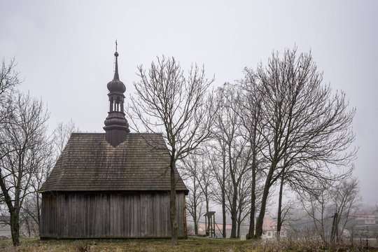 Old wooden christian church in Chotelek, near Busko-Zdrój, Poland.