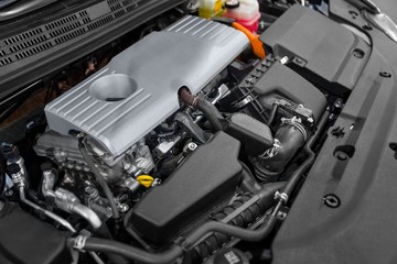 Detail photo of car engine under the hood