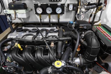 Fototapeta premium Detail photo of car engine under the hood