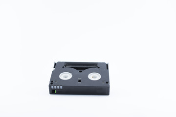 Old video cassette tape on white background.