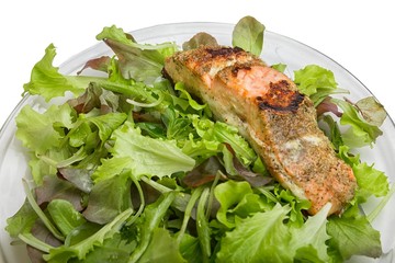 Grilled salmon on salad