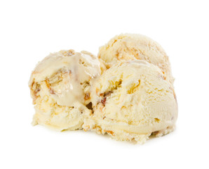 Fototapeta na wymiar Three balls of vanilla ice cream with caramel