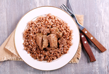 Buckwheat and veal stew on plate