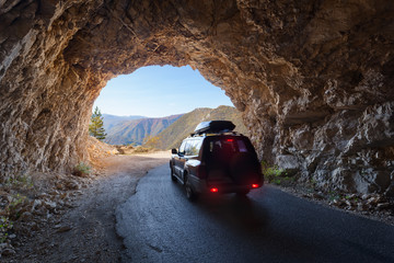 Driving through road tunnel at beautiful Piva canyon in Montenegro © rasica