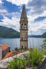 Tower of St Nicholas church in Perast, old coastal town in Kotor Bay, Montenegro