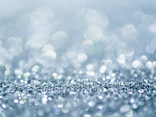 Silver Sparkling Glitter bokeh Background.