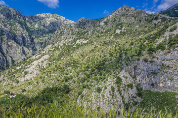 Fototapeta na wymiar Rocky mountains above Kotor town in Montenegro