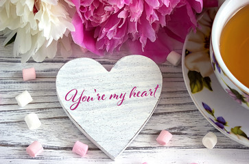 Valentines day greeting card with peonies tea cup marshmallow and lettering you are my Valentine.