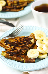 Crepes with banana and chocolate sauce