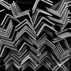 Construction steel profile of angles bunch at the warehouse of steel products.
