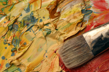 Obraz premium Close up of artists palette, oil paints and brush