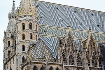 View of the St. Stephen's Tower among the beautiful architecture of the surrounding houses.