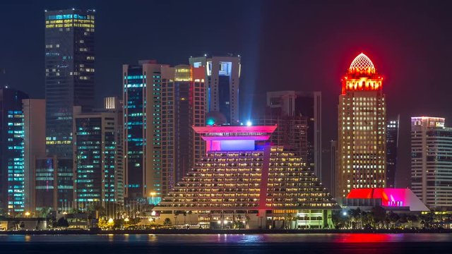 Doha skyscrapers in downtown skyline night timelapse, Qatar, Middle East