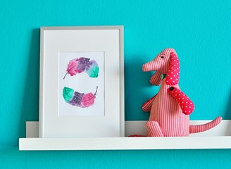 handmade watercolor illustration of colorful feathers, children's room decoration, funny  cute toy