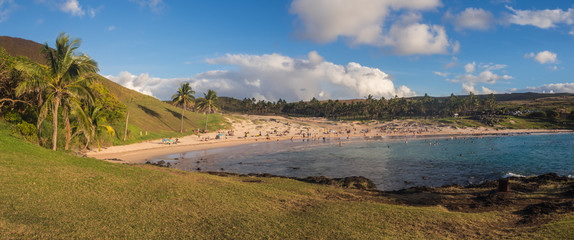 Panoramic of Anakena beach in Easter island in Chile. Blue sea, sand, palms and blue sky in this peacefull place
