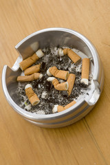 Ashtray full of extinguished cigarette butts