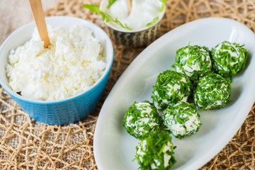 Fresh curd in bowl,cheese ball with chive,cream.