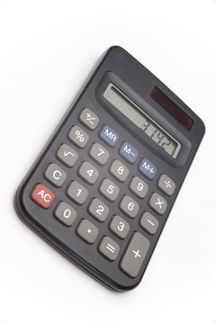 Calculator on white background showing value of pi