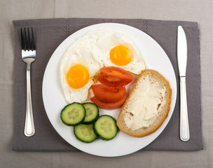 Two Fried Eggs on White Plate