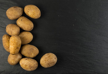 Potatoes Boiled in Their Skins on Stone Background