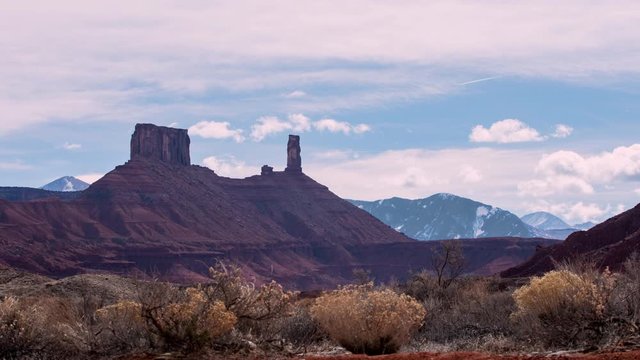 Zoomed time lapse view of Castleton Tower in the Utah desert near Moab.