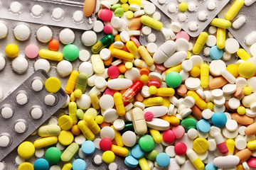 Medicine pills and colorful blister packs