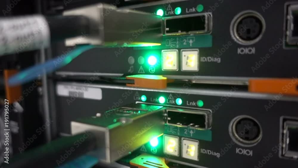Poster flashing lamp. rack mounted servers in a server room, server rack audio cable. severs computer in a 