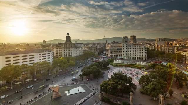 BARCELONA, CATALONIA - JULY 26th 2017: Timelapse of city centre from above rooftop architecture