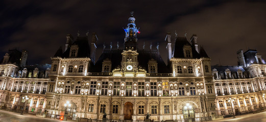 Panoramic view of town hall of Paris at night.