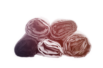 Close Up rolled of pants showing texture on white background