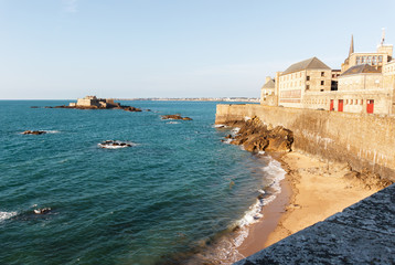 Fototapeta na wymiar High tide at Saint Malo old city wall