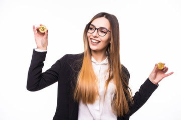 young successful confident woman with glasses holds a gold bitcoin in her hand isolated on white