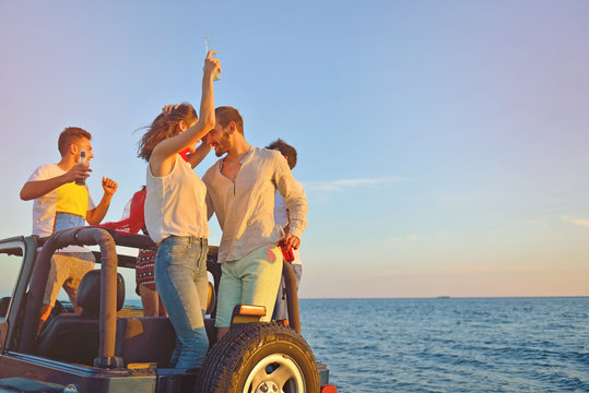 Group Of Happy Friends Making Party In Car - Young People Having Fun Drinking Champagne