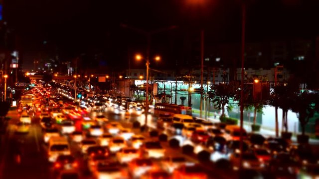 4K Time Lapse : Abstract blurred traffic jam at Rama IV road in Bangkok, Thailand - Miniature effect