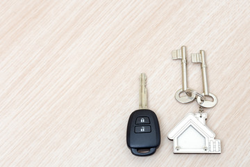 Car and house keys on table. Concept of success.