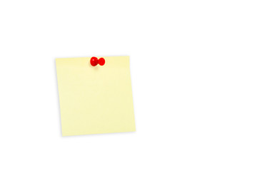 Yellow paper pinned to white background