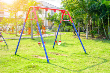 Empty swing in the playground