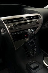 Modern car dashboard. Automatic transmission and control buttons.