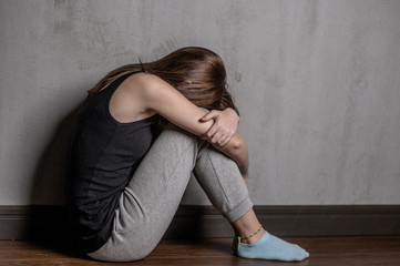 depression teen girl sit on the floor