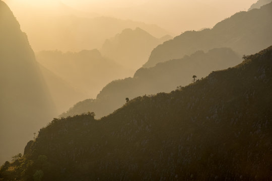 mountain silhouettes at the sunset, Chiang Dao national park. Thailand