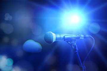 Close-up of microphone in concert hall or conference room,graphic design background.Mixed media