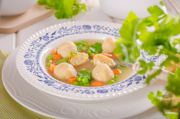 Fresh vegetable soup with chicken dumplings