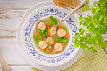 Fresh vegetable soup with chicken dumplings