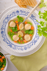 Fresh vegetable soup with chicken dumplings
